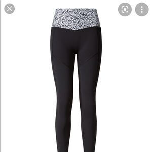 Used black and mosaic print. Lululemon size 2